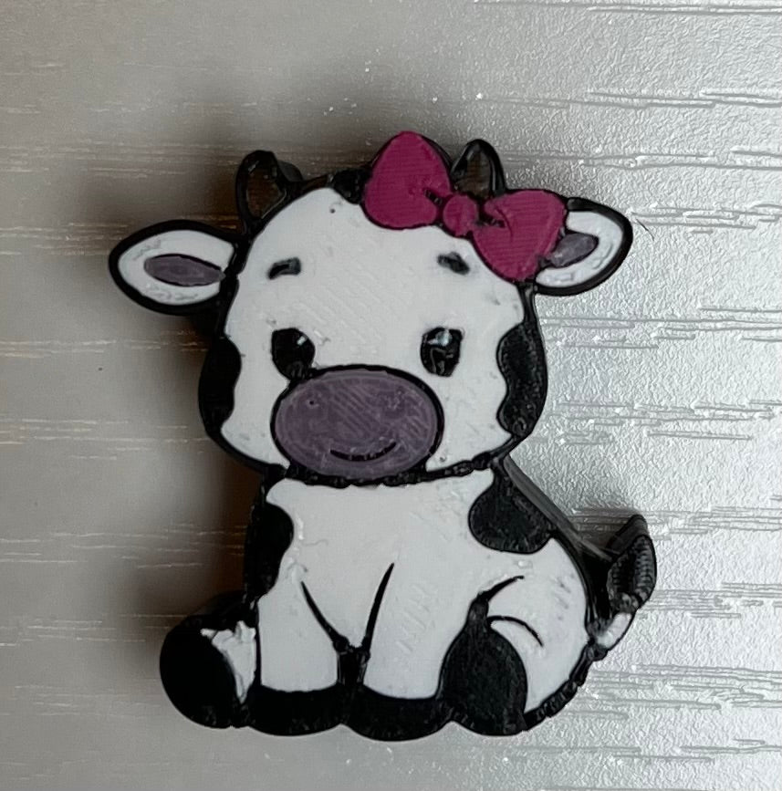 COW WITH BOW